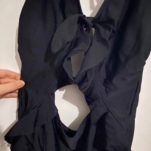 Black one-piece with cut outs
